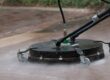 Pressure washing using flat surface cleaner