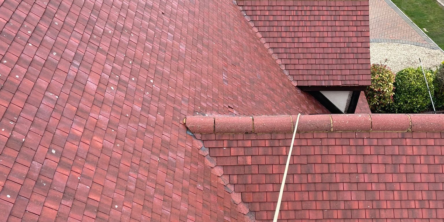 Roof after – Moss removal from roof Roof Before - Moss removal from roof