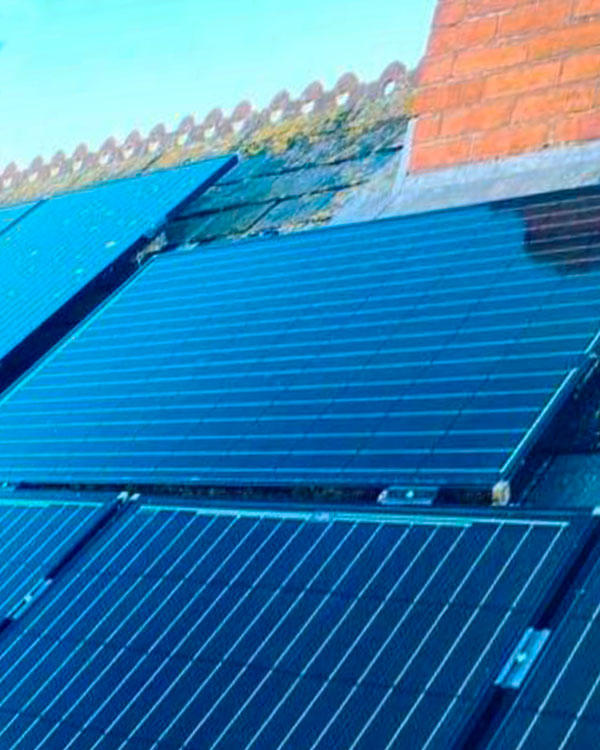 Solar Panel After Lichen is Removed Solar Panel Cleaning Oxfordshire - Cleaning roof-mounted solar panels can increase solar yield by up to 14%